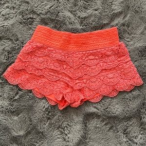 Coral ruffled shorts